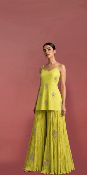 Luxury yellow embroidered Indo-Western co-ord set with embellished camisole top and crinkle sharara for festive and wedding wear