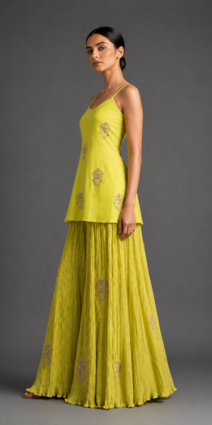 Luxury yellow embroidered Indo-Western co-ord set with embellished camisole top and crinkle sharara for festive and wedding wear