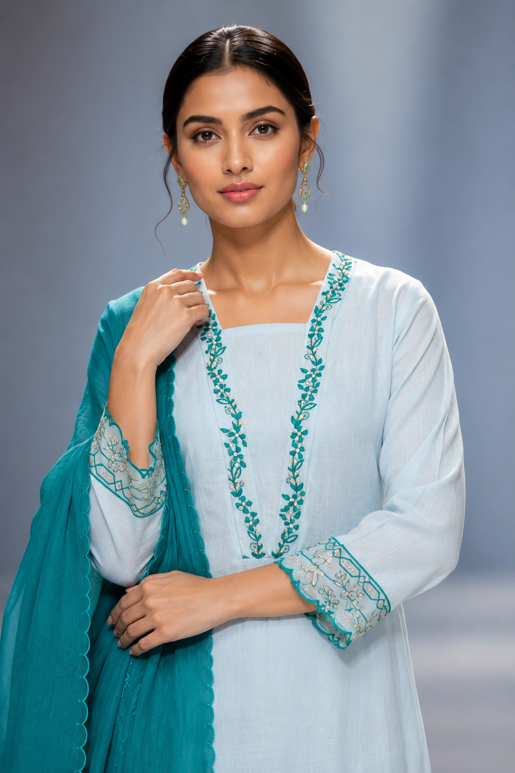 Pakistani Blue closeup Noor Jahan Suit Set with floral embroidered straight kurta, matching palazzo pants, embroidered sleeves, and rama green dupatta for festive and occasion wear.