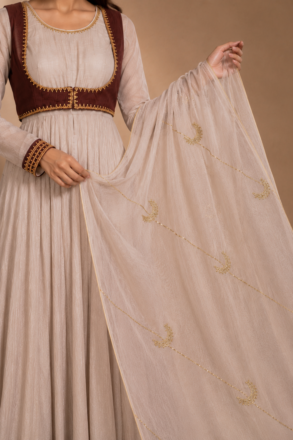 brown jacket dupatta Noor-e-Chand Ensemble - A luxury ivory chanderi Anarkali with hand-embroidered brown sleeveless jacket and self-coloured dupatta featuring diagonal Chand Baali embroidery.